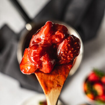 Strawberry Compote on a wooden spoon